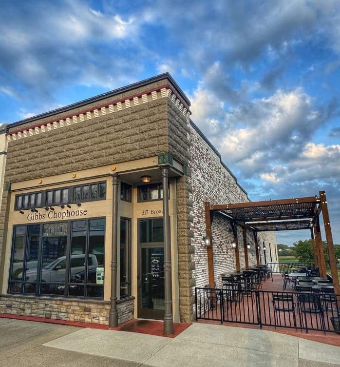 Gibbs Chophouse exterior - Historic building with outdoor patio in Stanton, Iowa